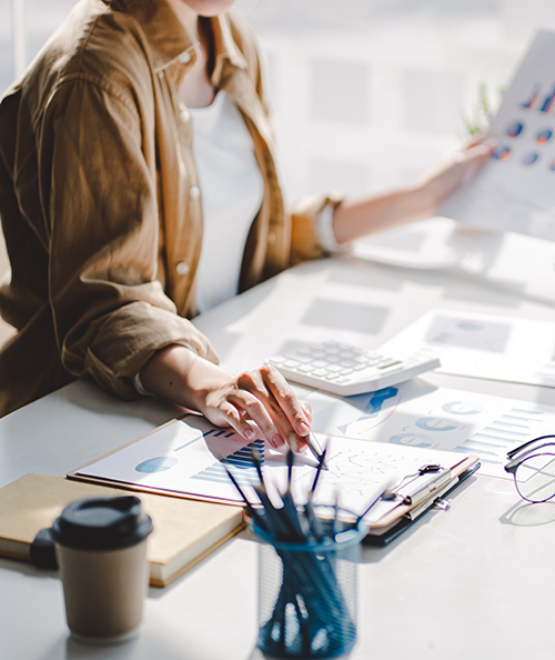 Portrait of a business woman working on a tablet computer in a modern office. Make an account analysis report. real estate investment information financial and tax system concepts